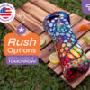 Colorful patterned wine bottle cooler on wooden table with citrus slices, featuring rush delivery options from CoolieNation.