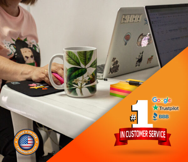 Focused woman drinking coffee and typing on her laptop