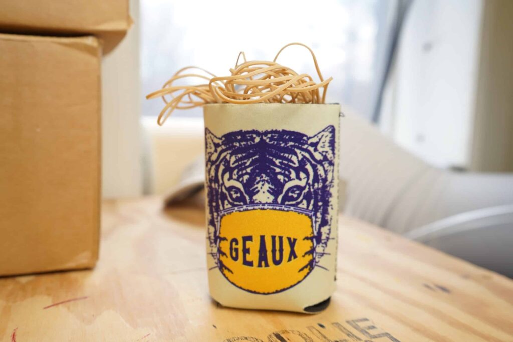 Custom koozie featuring a bold 'Geaux' design for fans of Louisiana pride