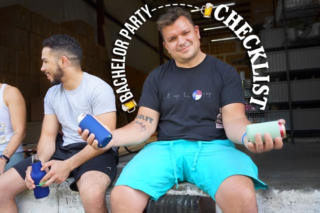 Group of guys holding bachelor party koozies with custom designs