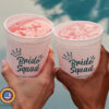 Customized stadium cups featuring the text "Bride Squad" for a wedding celebration