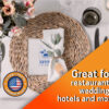 personalized white napkins with the hotel’s business logo on a formal dining table